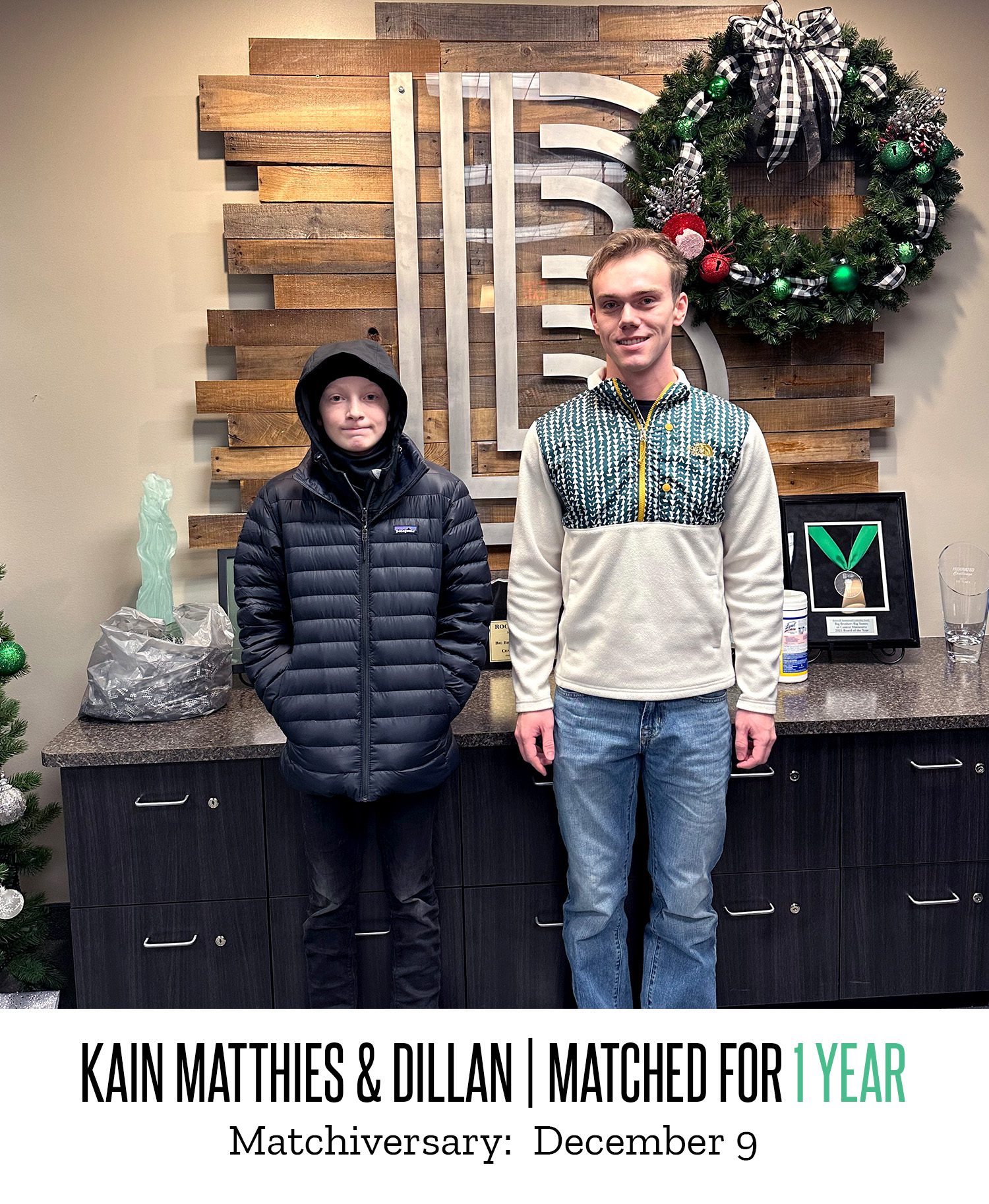 Kain Matthies and Dillan pose for a picture after being matched for one year